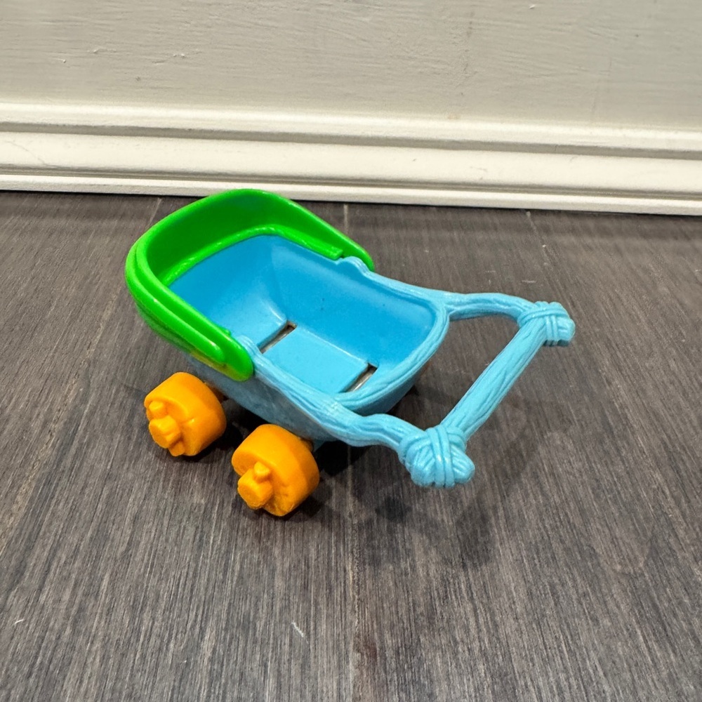 VINTAGE 1986 Hanna Barbera Small Vibrant Toy Stroller with Blue Green Accents